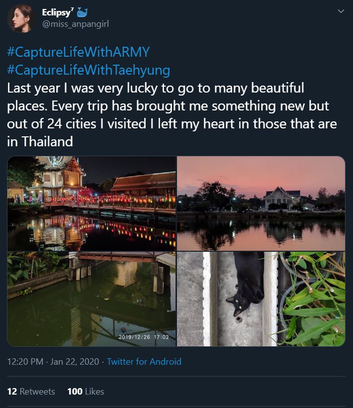 Tweet from an ARMY participating in the Bonus Mission Capture Life With ARMY. The tweet states that the ARMY visited 24 cities last year but left their heart in Thailand. The accompanying photos are presumably taken in Thailand. One photo is of a temple lit with paper lanterns at night time. Another is of a white, two story house at sunset. The third photo shows a body of water with lush, tropical plants on the bank. The fourth photo shows a black cat lying on its side next to potted plants.