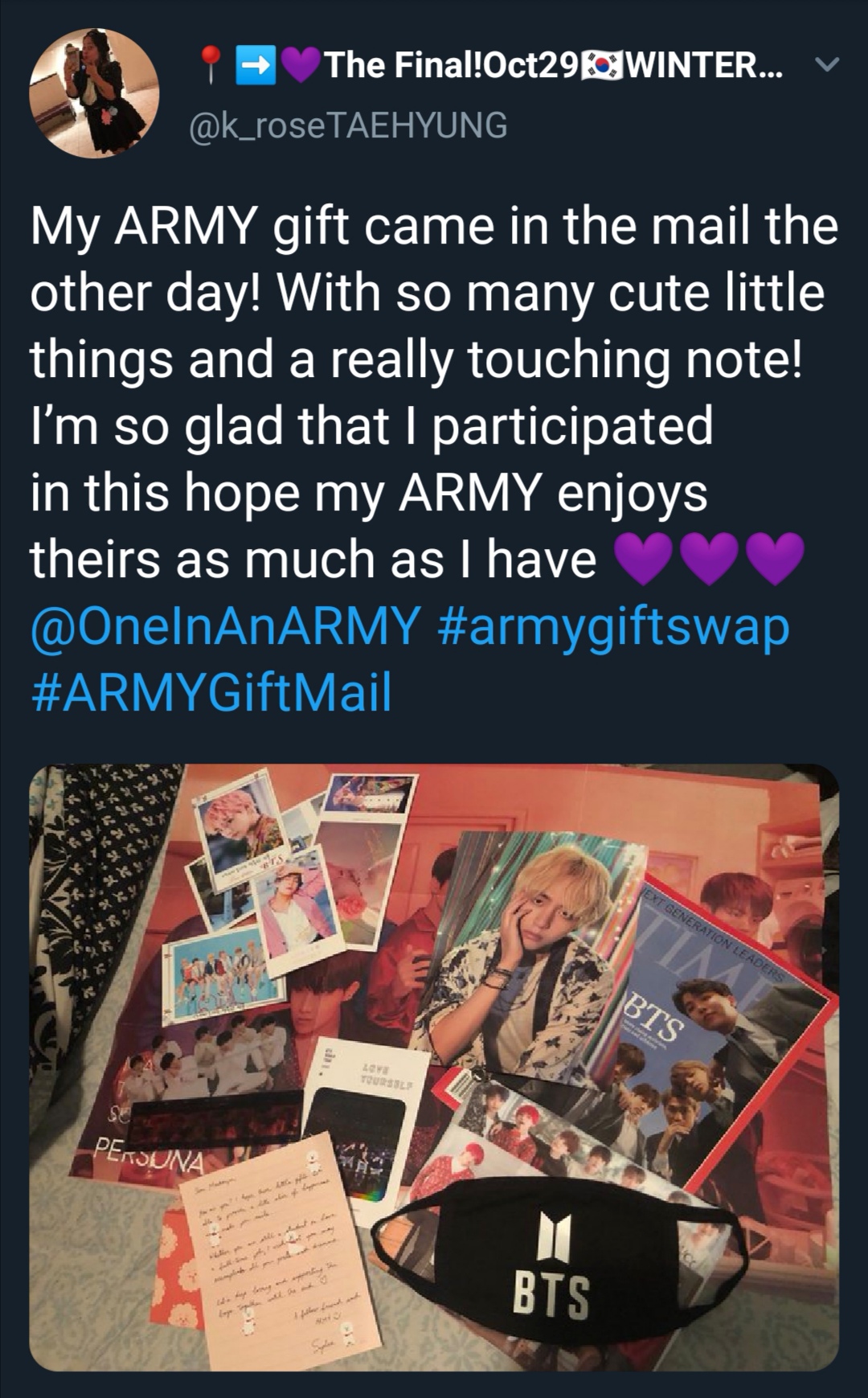 Tweet that shows what an ARMY received from the ARMY Gift Swap. Photo shows a copy of TIME magazine with BTS on the cover, a black facemask with the word BTS and BTS' logo on it, and a number of photos and posters of BTS