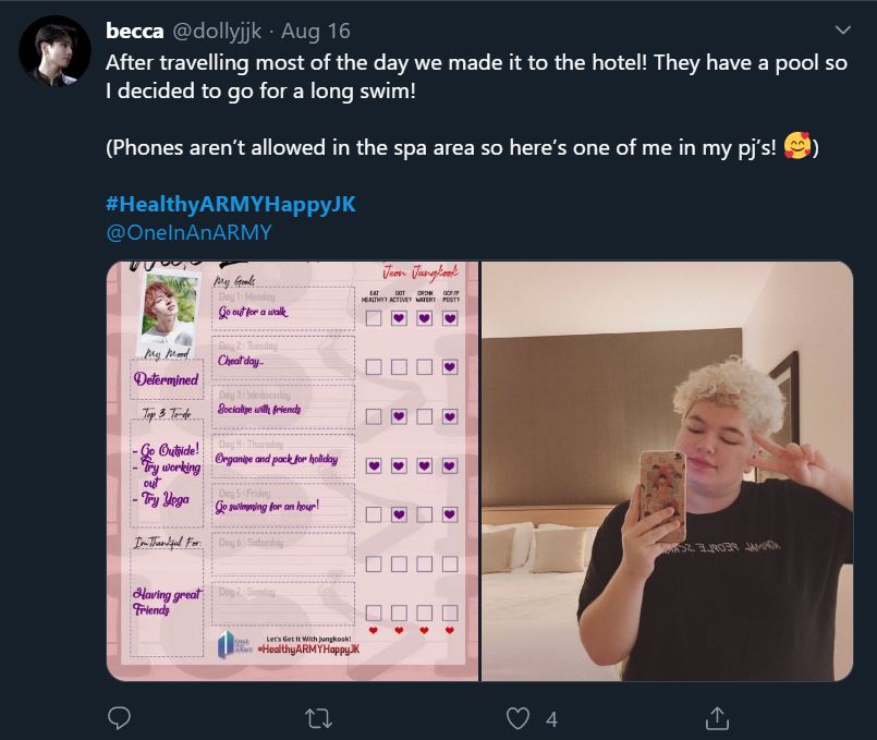 Tweet showing an ARMY participating in the bonus mission Healthy ARMY Happy Jungkook. The ARMY is white with curly platinum blond hair standing in a hotel room.