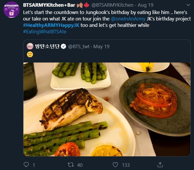 Tweet showing an ARMY participating in the bonus mission Healthy ARMY Happy Jungkook. The tweet is quoting a tweet from the BTS twitter account that shows what Jungkook ate while on tour. Jungkook's tweet shows a grilled chicken breast, grilled asparagus, grilled tomato slices, and grilled lemon slices.