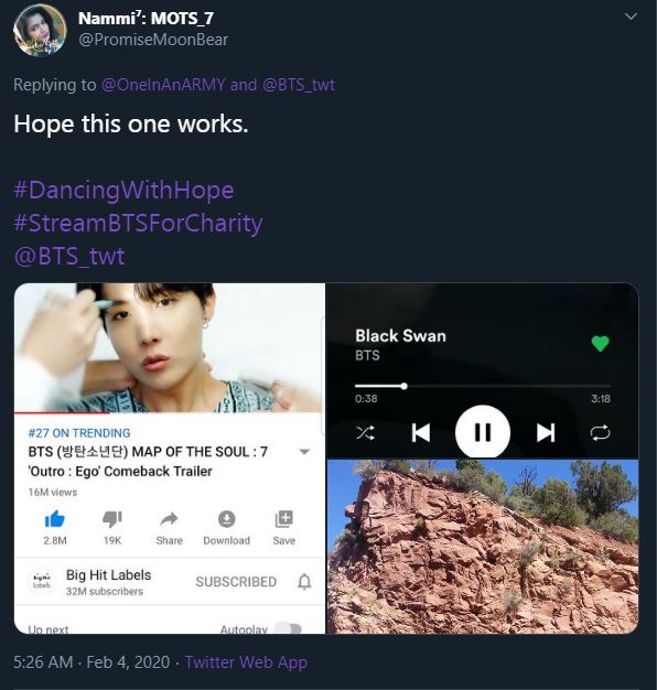 Screenshot of a tweet of ARMY streaming the Ego music video on YouTube and Black Swan on Spotify. There's also a cropped photo of a red stone cliff.