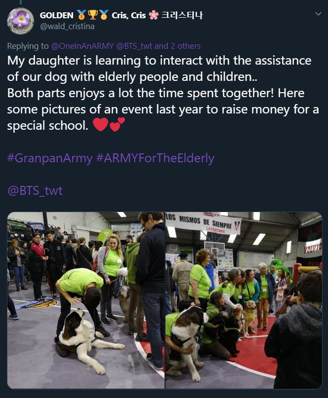 Tweet with the text "my daughter is learning to interact with the assistance of our dog with elderly people and children. Both parts enjoy a lot the time spent together! Here some pictures of an event last year to raise money for a special school #GranpanARMY #ARMYForTheElderly @BTS_twt" with a red heart and two hearts emoji. The tweet includes two photos showing a crowd of people and a number of service dogs.